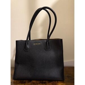Michael Kors Black large pebbled leather bag.
